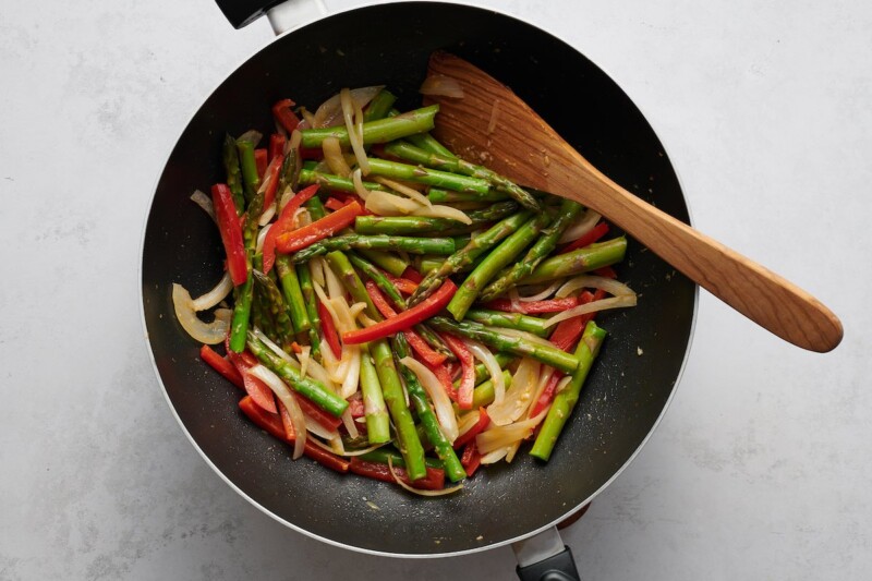 stir frying asparagus.