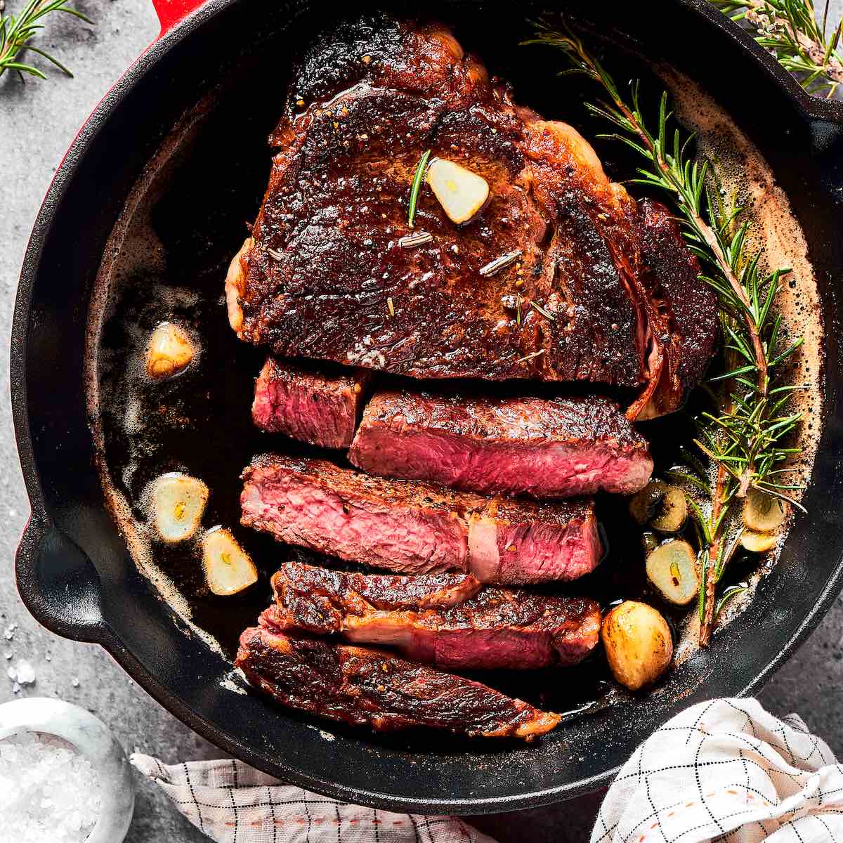 https://thebigmansworld.com/wp-content/uploads/2023/04/cast-iron-steak-recipe.jpg