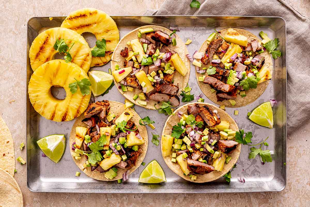 tacos al pastor on tray.