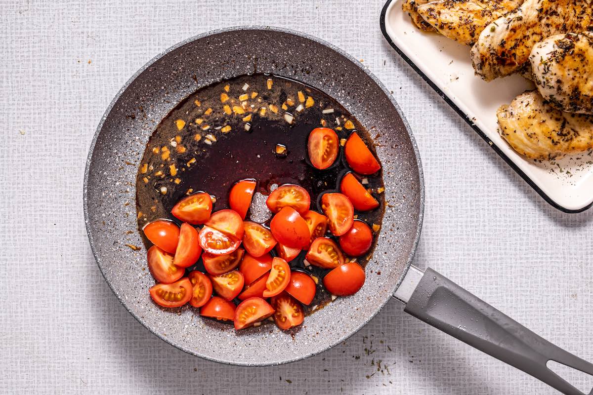 balsamic and tomatoes in skillet.