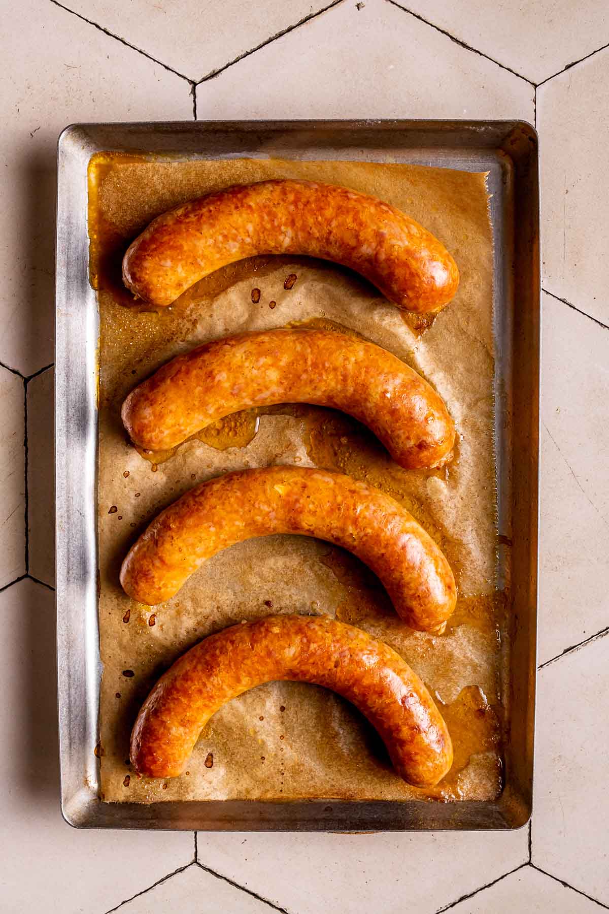 brats in the oven.