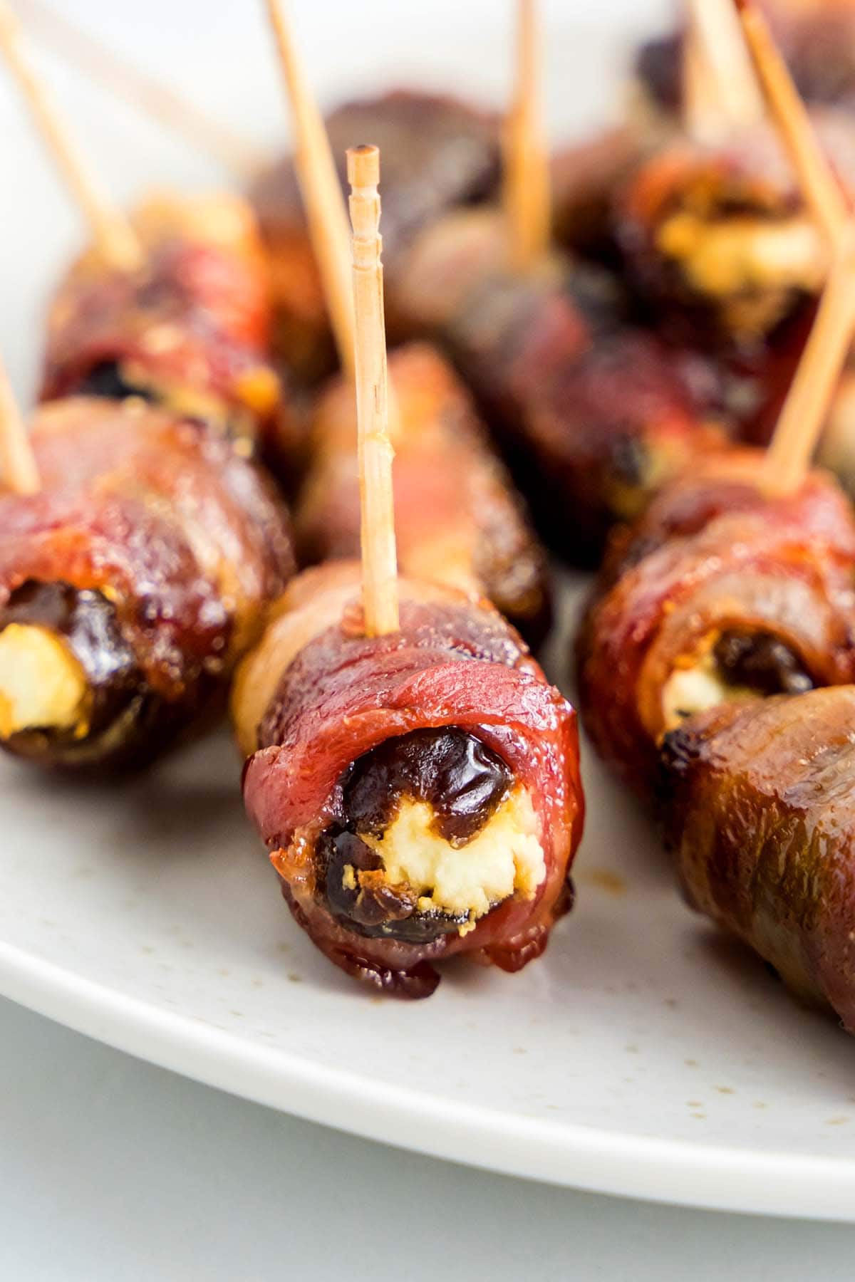 bacon wrapped dates with goat cheese.