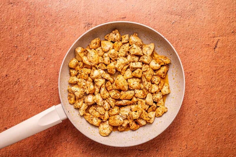 browned chicken in skillet.