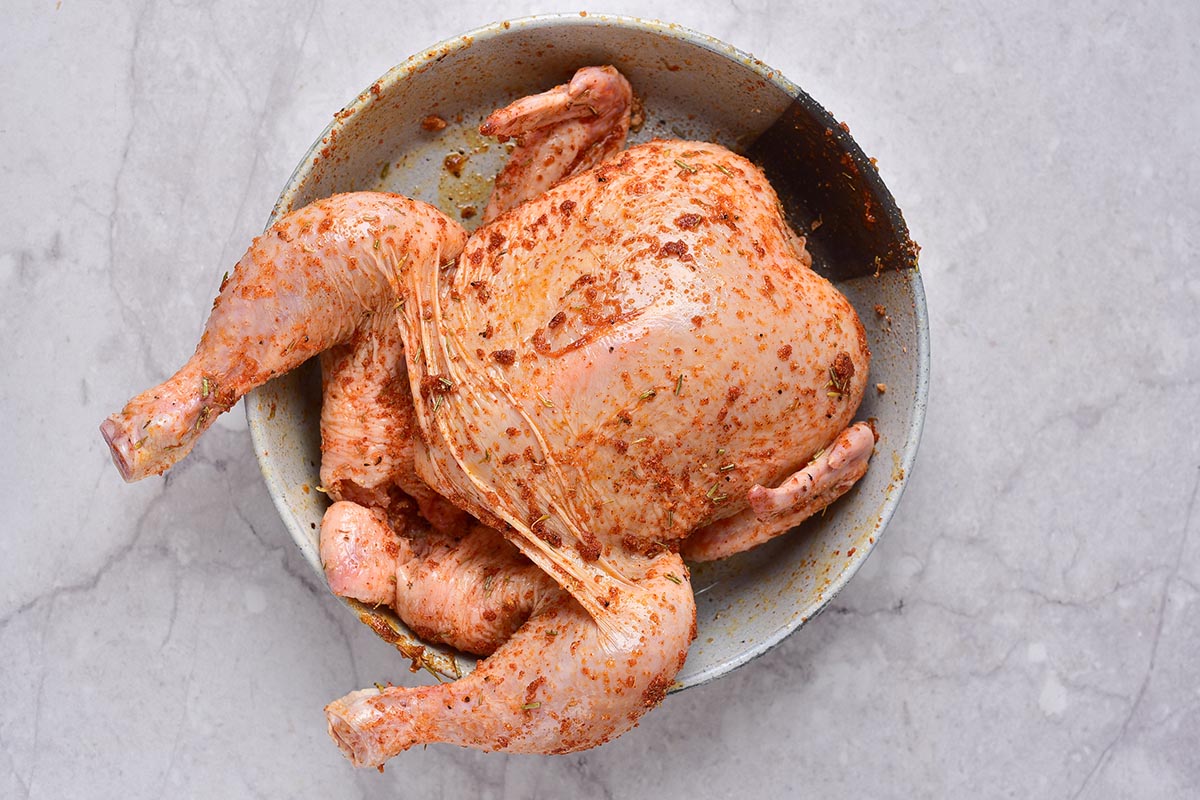 dry rubbed hen in bowl.