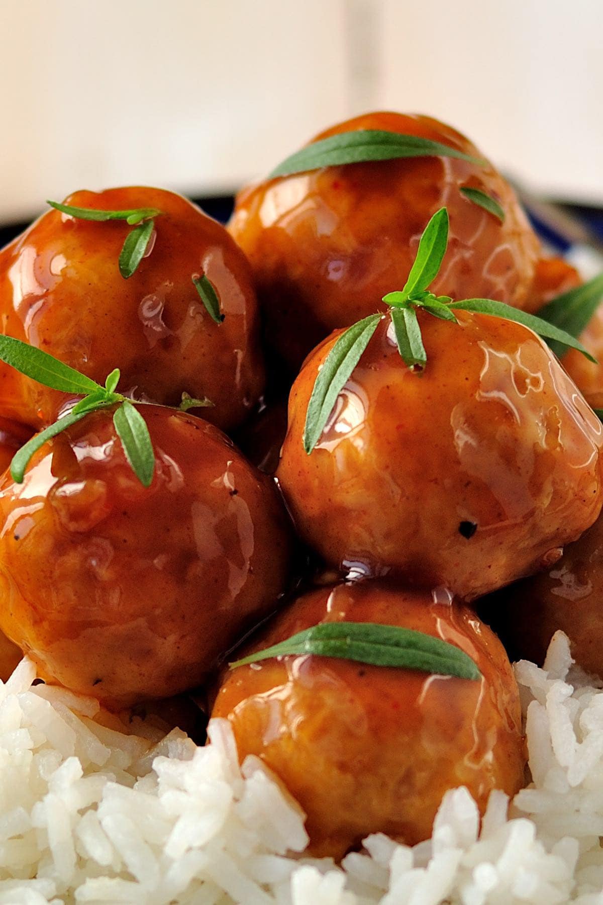 sweet and sour meatballs on rice.