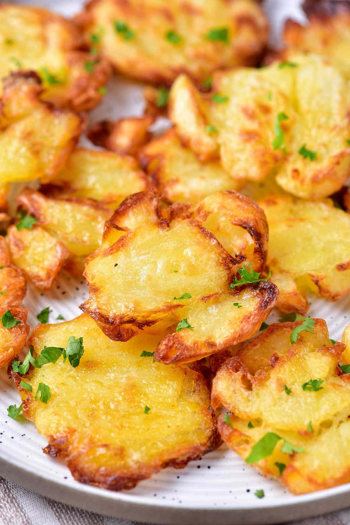air fryer smashed potatoes with herbs.