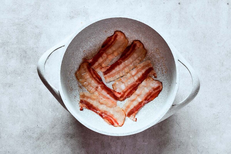 bacon strips in pot.