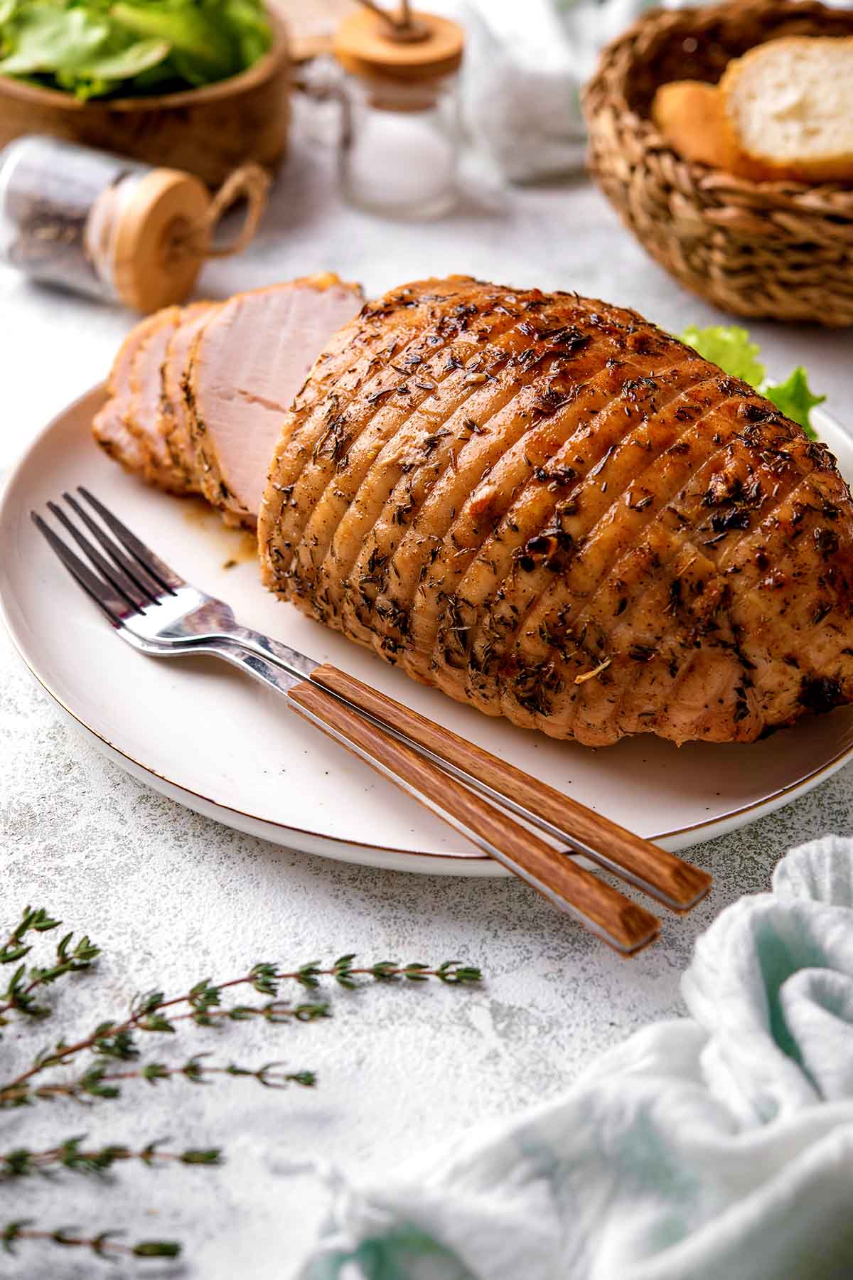 boneless turkey breast roast on a plate.