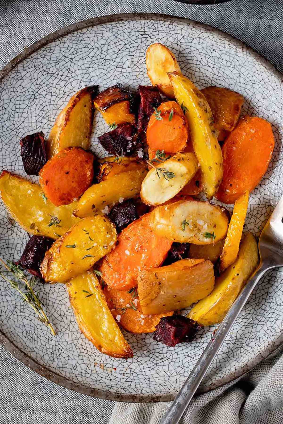root vegetables roasted on a plate.