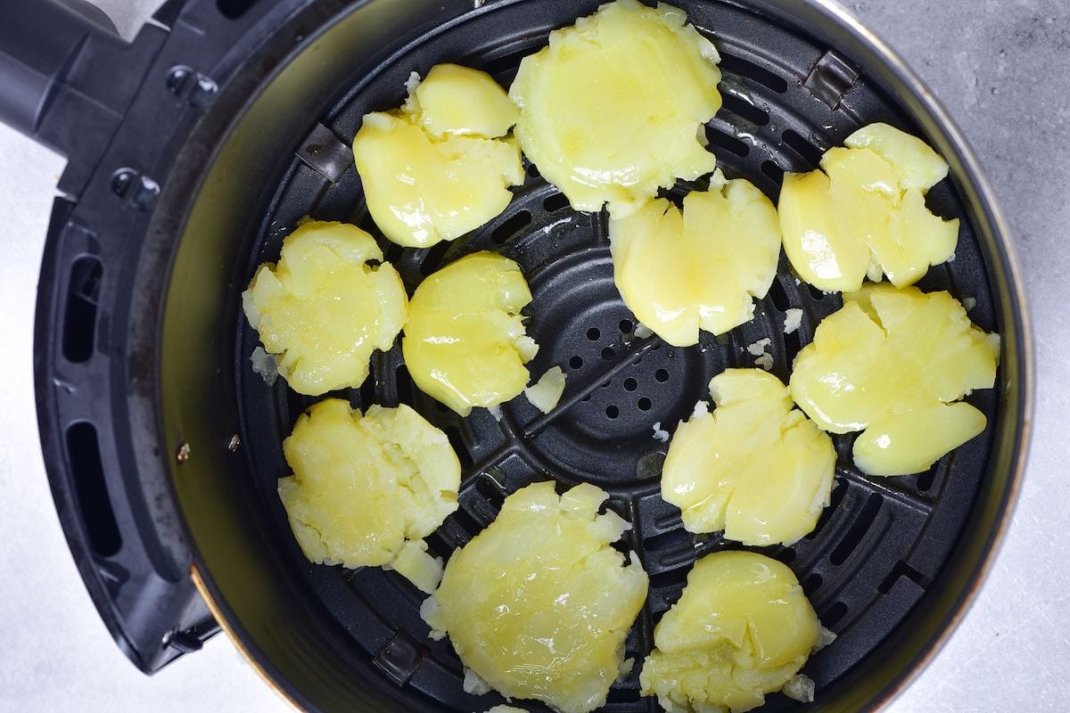 butter-rubbed potatoes in air fryer. 