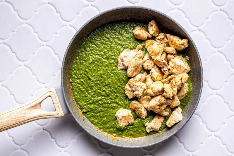 chicken mixed with spinach sauce.
