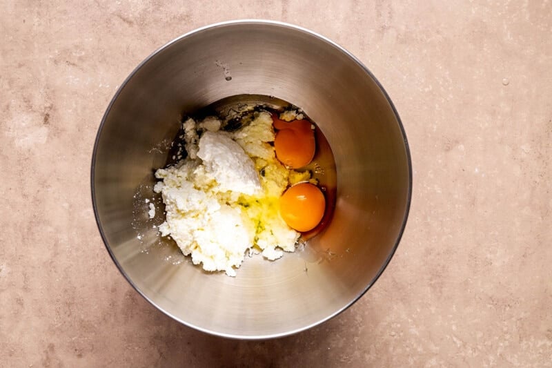 cottage cheese, eggs, and oil in bowl.