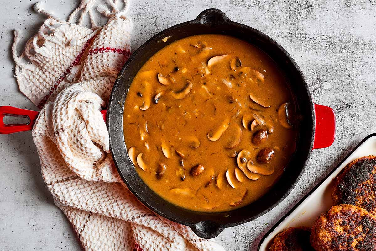 simmering gravy in skillet.