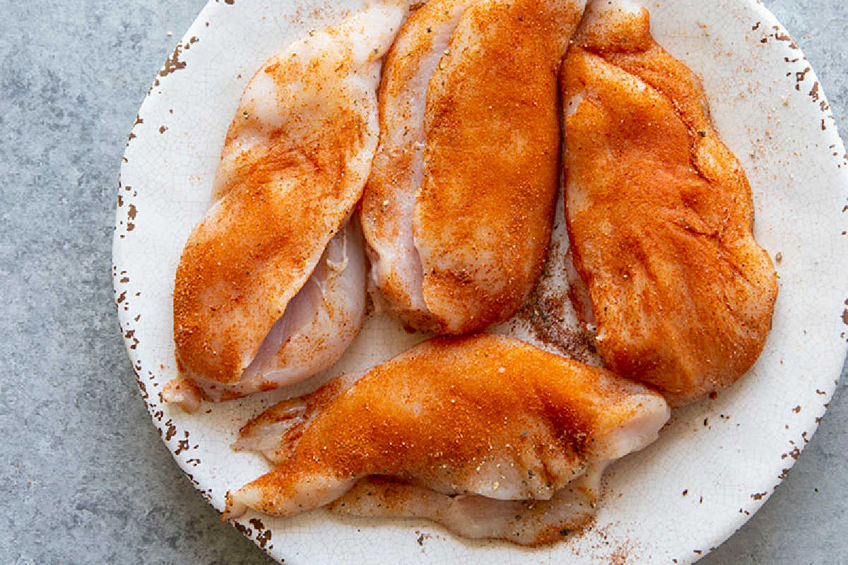 seasoned and sliced chicken breasts.