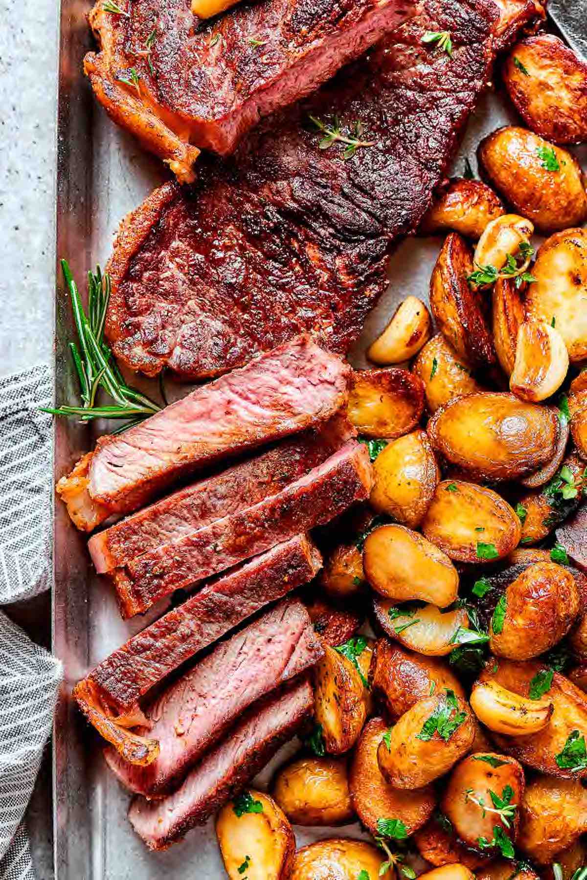 strip loin steak with potatoes.