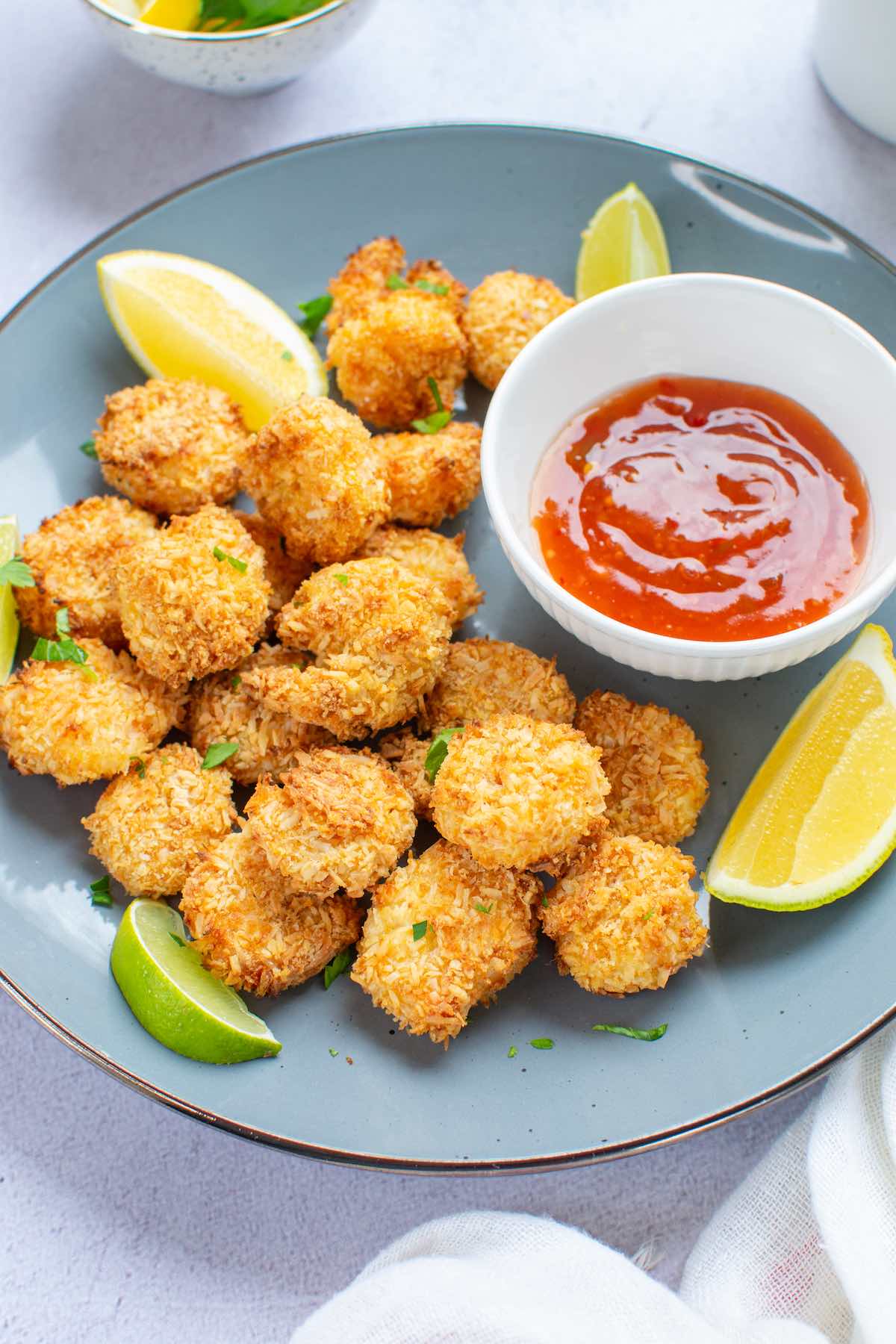 air fryer coconut shrimp with dipping sauce.