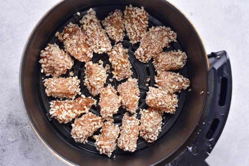 breaded chicken pieces in air fryer.