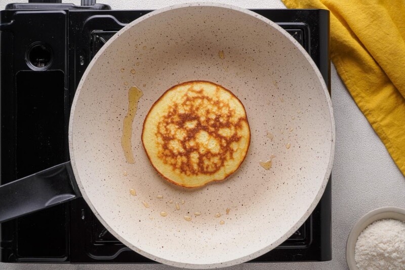 cooking pancakes on skillet.