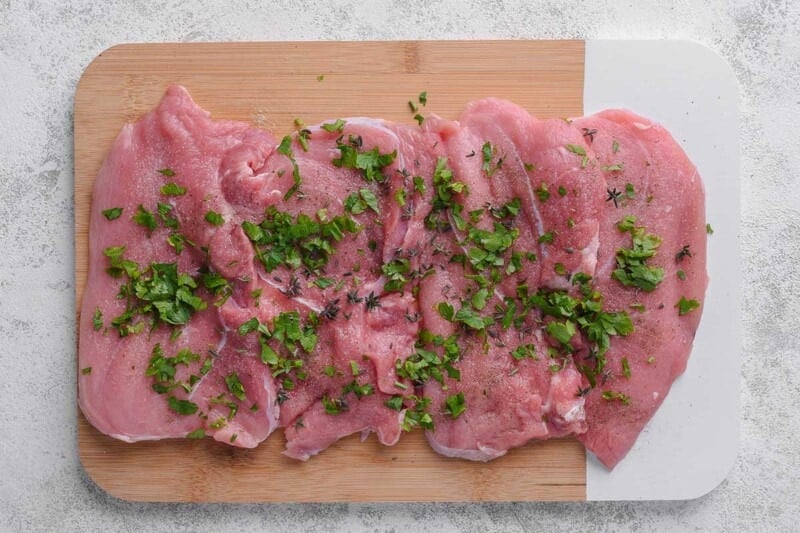seasoned raw veal cutlets.