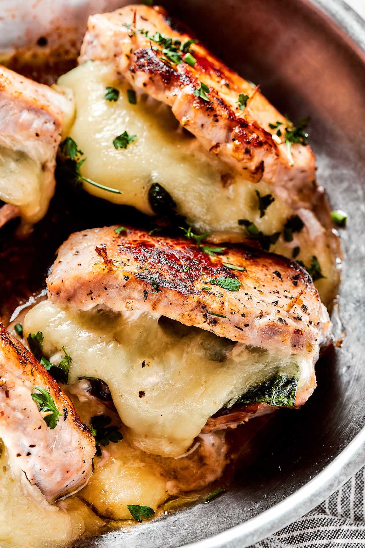 pork chops stuffed with spinach and cheese.