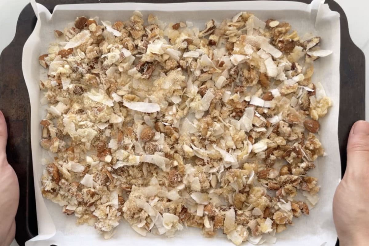 granola mixture on baking sheet. 