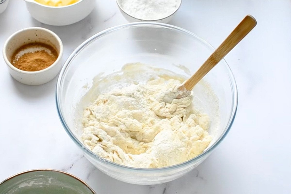 flour and vanilla yogurt in a mixing bowl. 