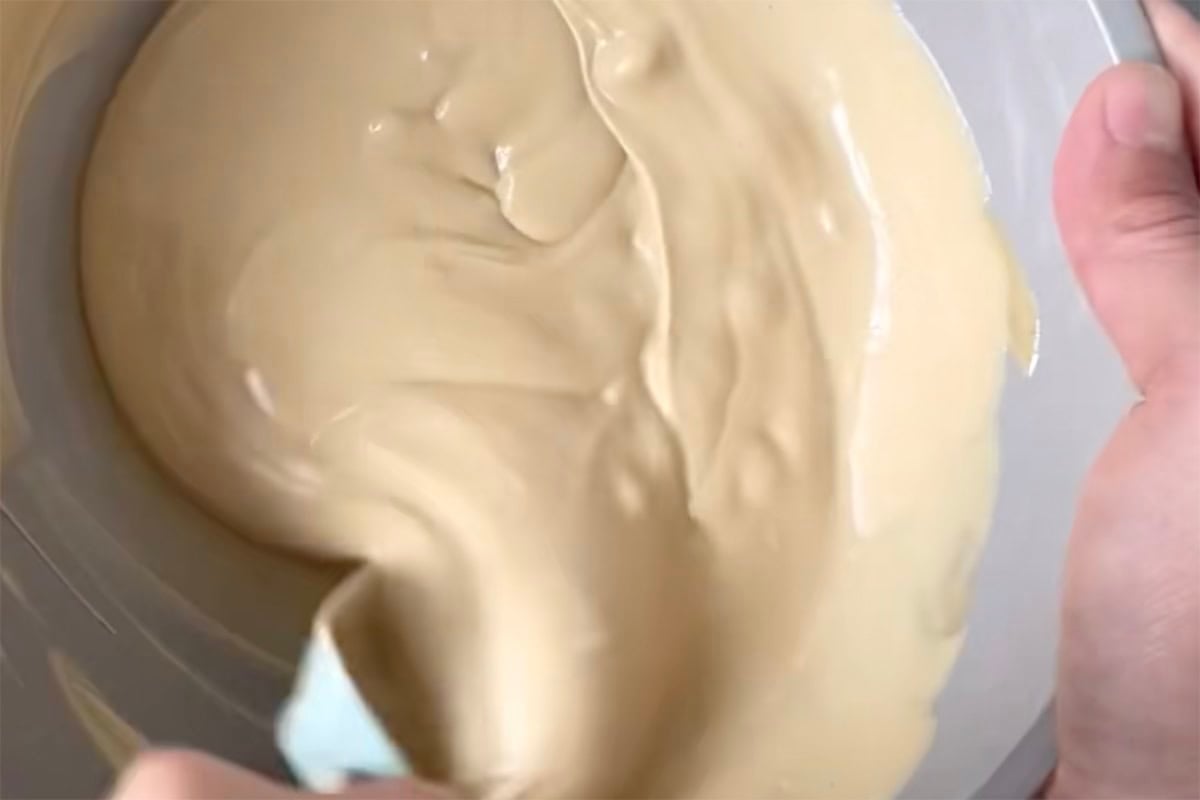 frosting and peanut butter in mixing bowl. 