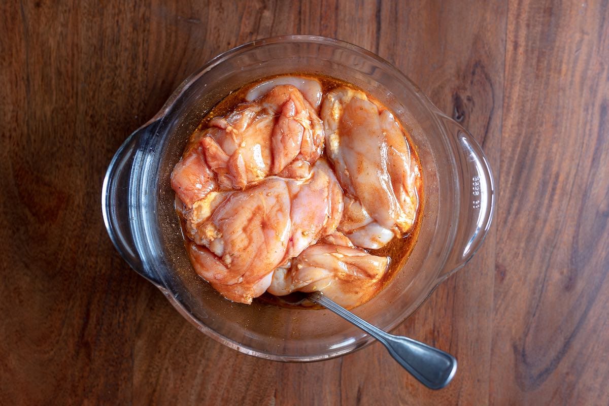 marinated chicken in a bowl.