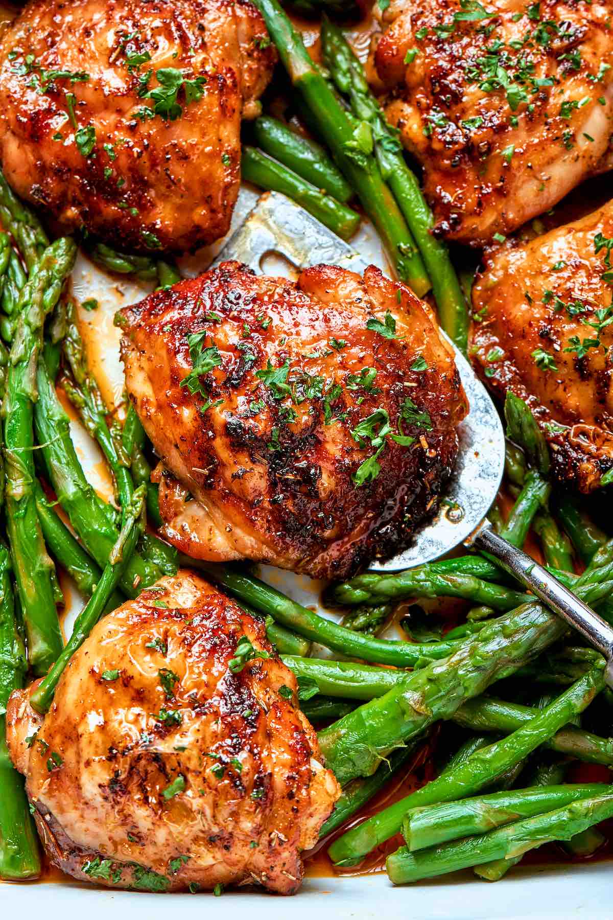 crispy air fryer chicken thighs with asparagus.
