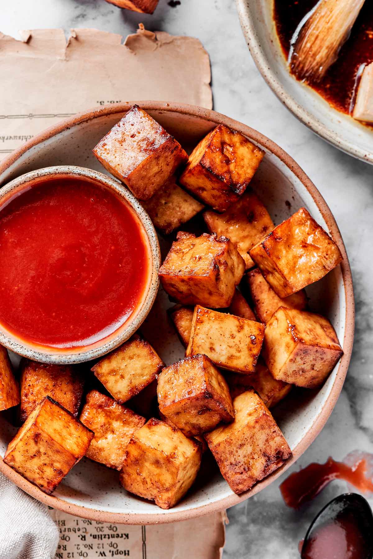 air fried tofu with a dipping sauce.