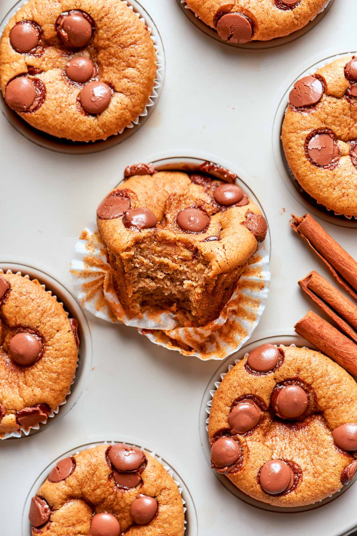 keto pumpkin muffins in a muffin tin.