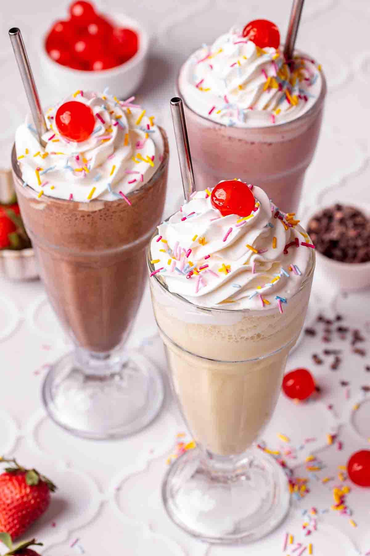 chocolate protein milkshake, vanilla protein shake, and strawberry protein milkshake.
