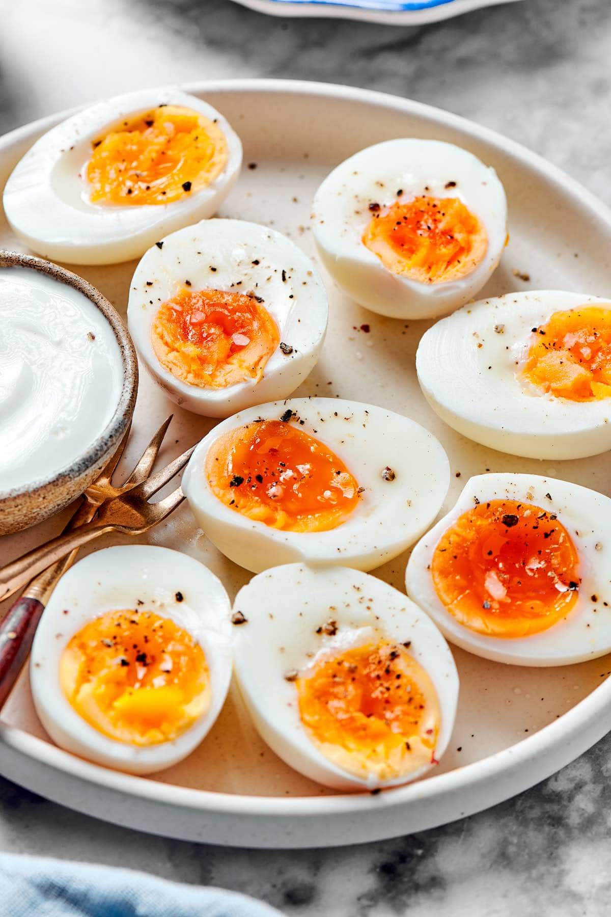 air fryer soft boiled eggs on a plate.