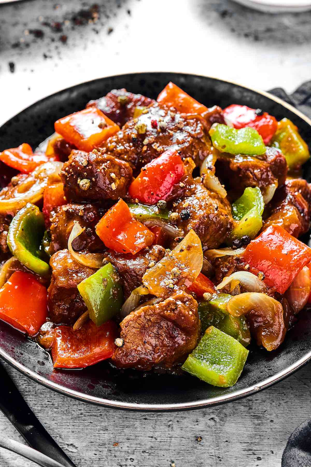 black pepper angus steak stir fry in a bowl.