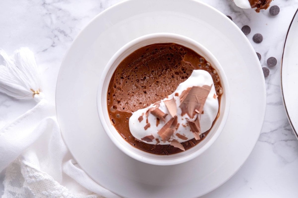 set pot de creme with whipped cream.