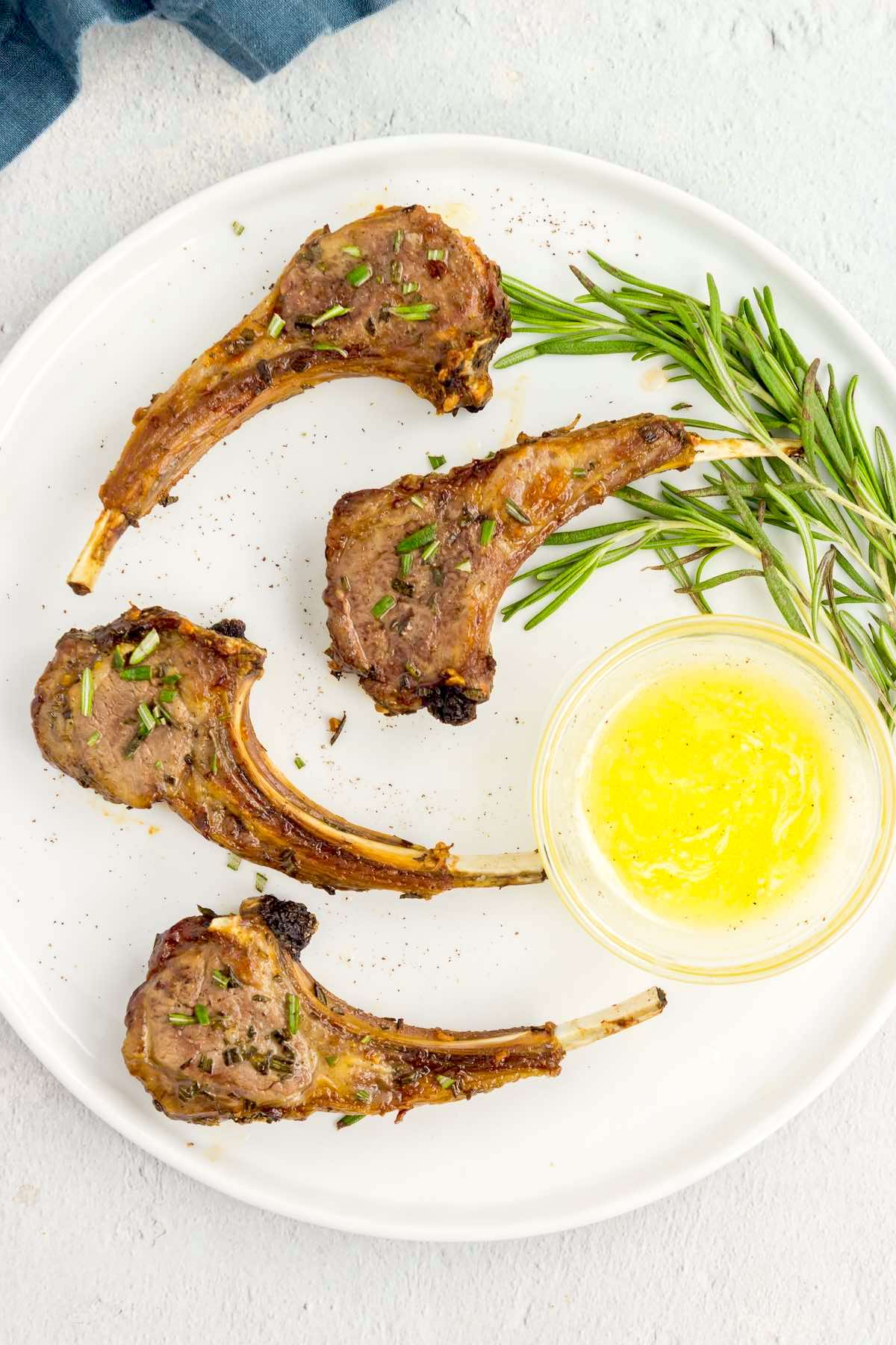 air fryer lamb chops on a plate.