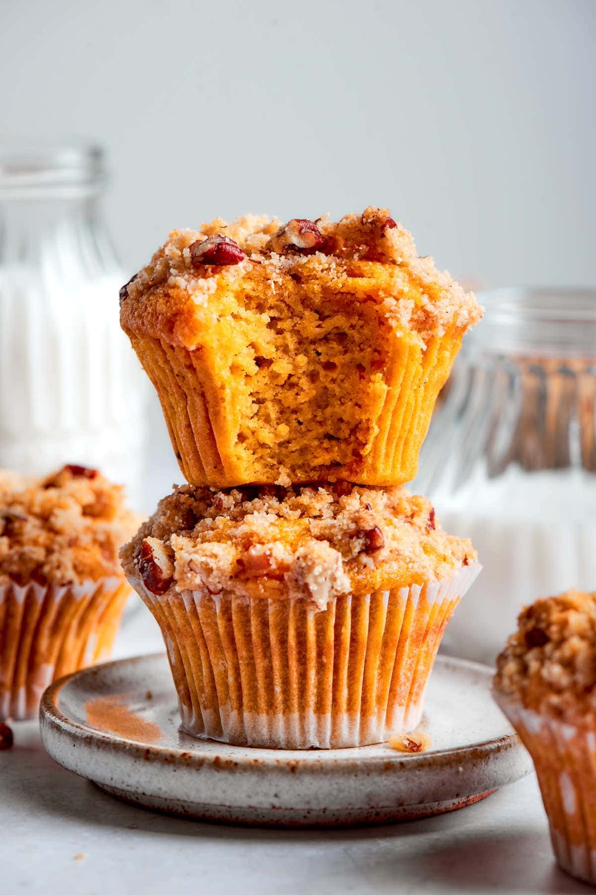 almond flour pumpkin muffins with streusel on top.