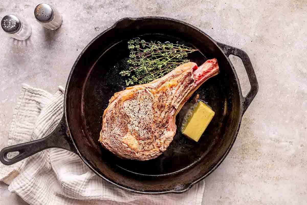 butter and thyme added to skillet.