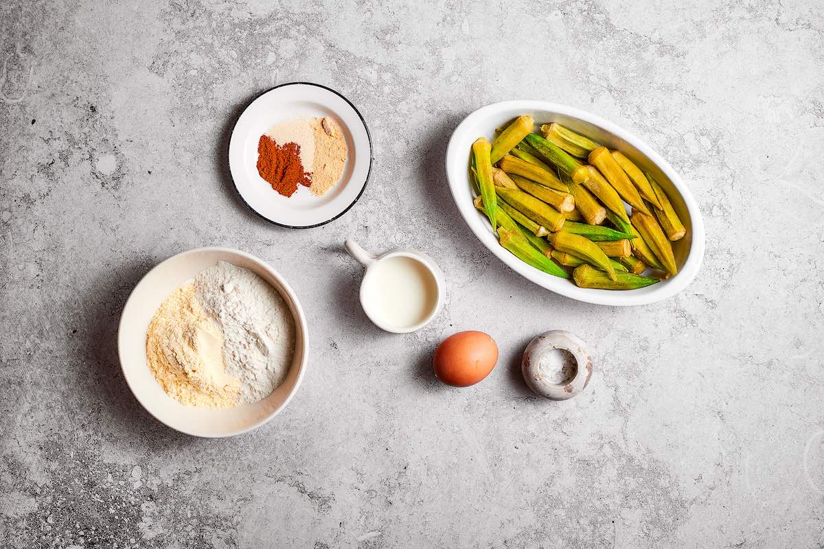 seasonings and okra in bowls.