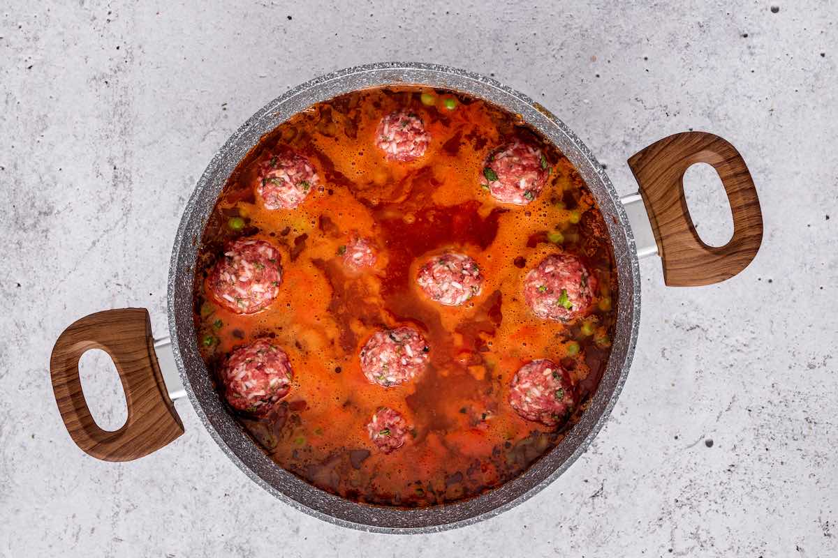 meatballs added to broth.