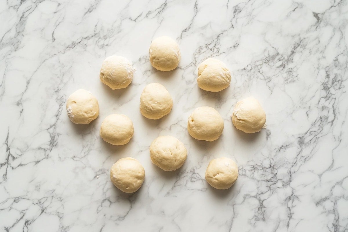 shaped unbaked donut holes.