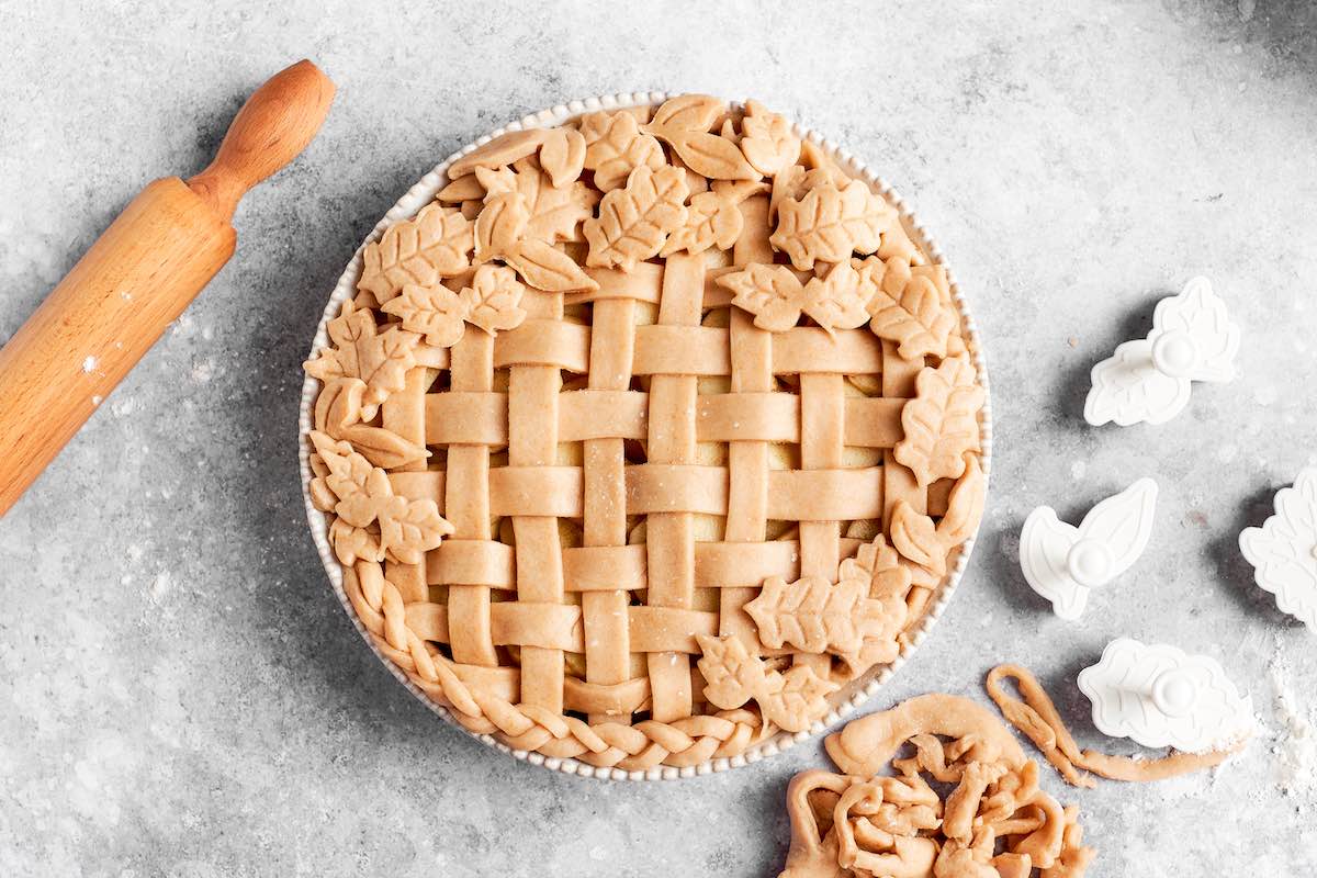 assembled apple pie with lattice topping.