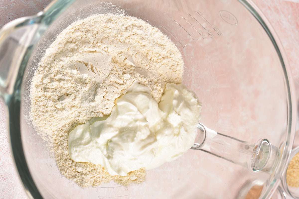 greek yogurt and flour in a bowl.