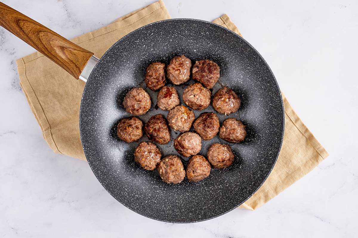 meatballs in a skillet.