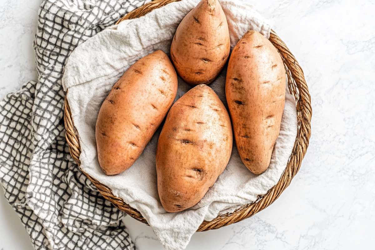 sweet potatoes with holes poked in.