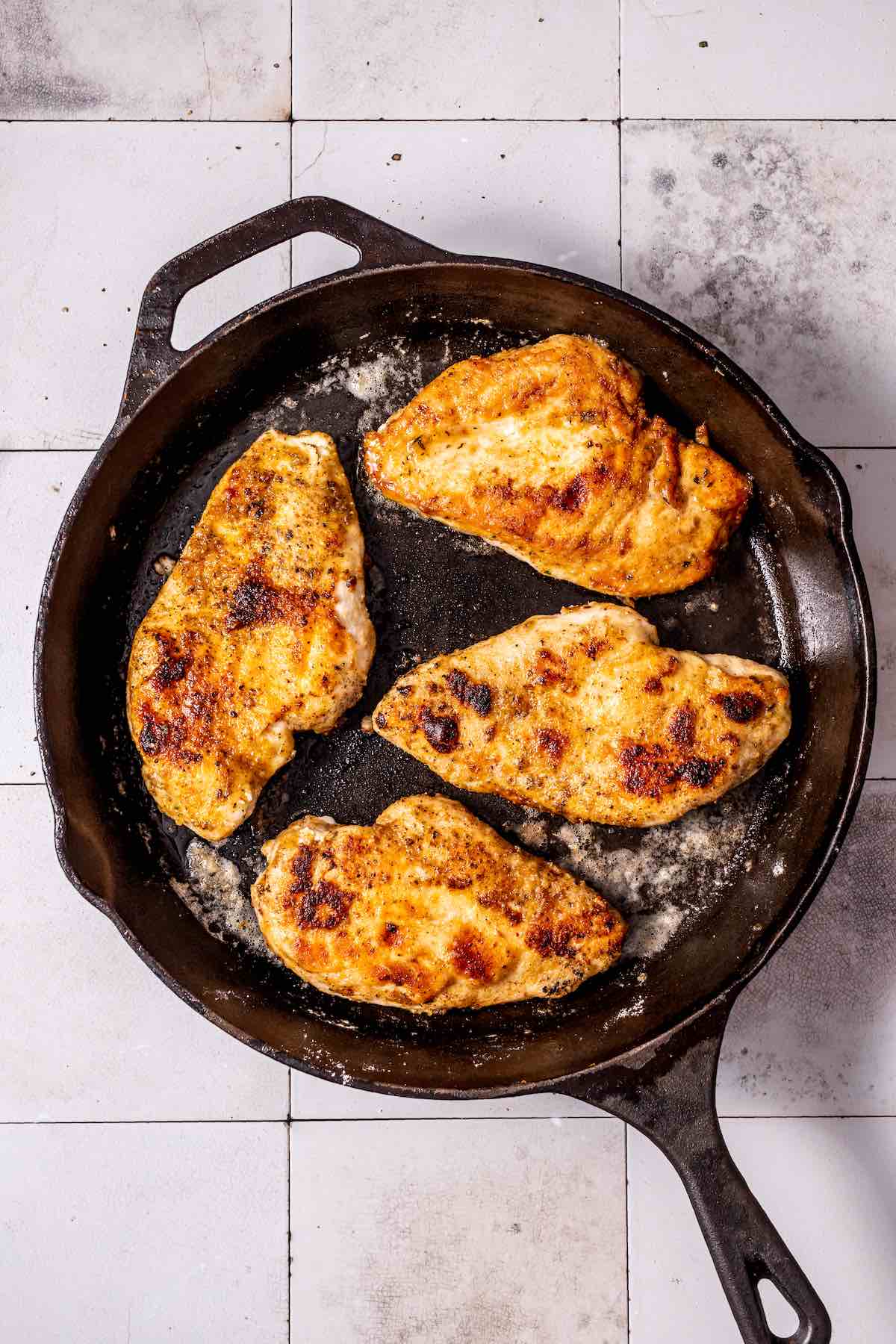 juicy pan fried chicken breasts.