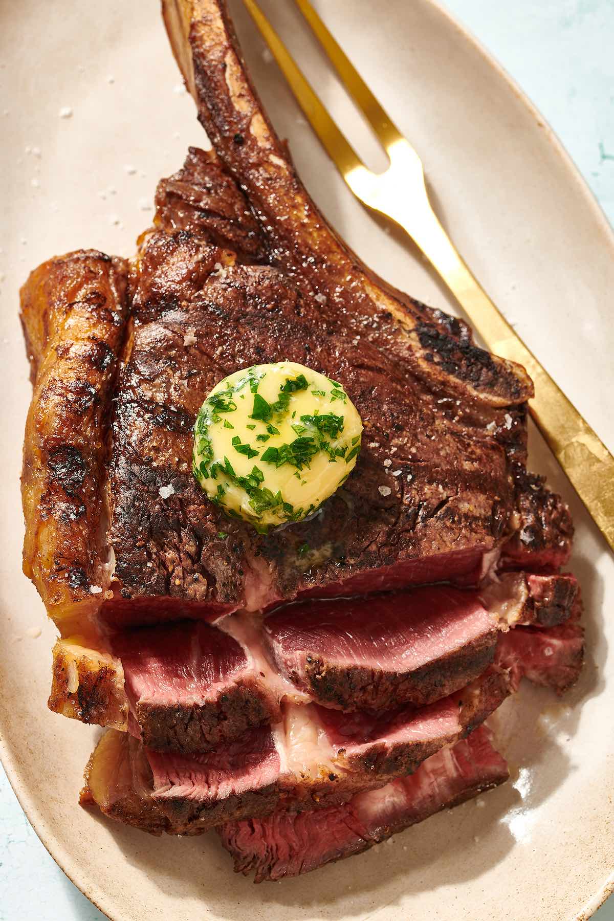 tomahawk steak with garlic butter.