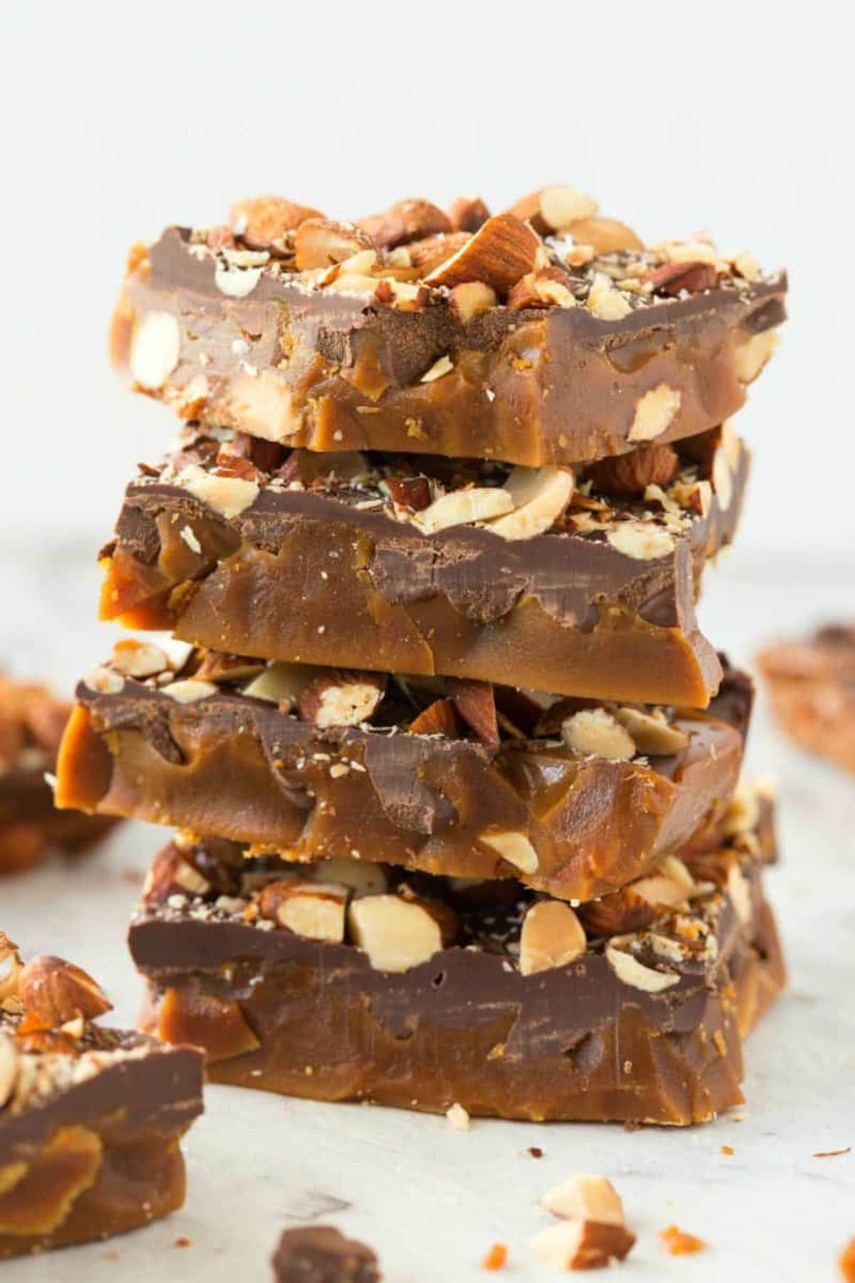 homemade almond roca stacked on top of each other.