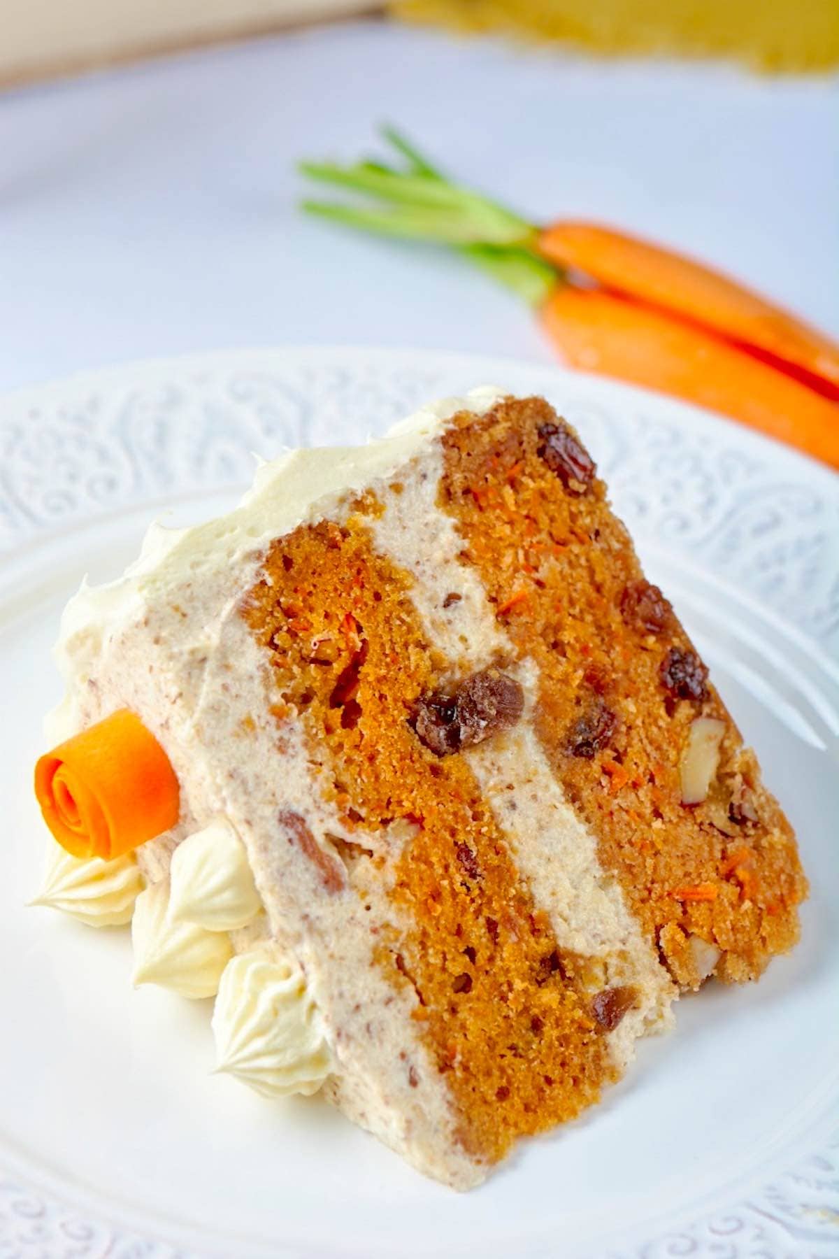 slice of healthy carrot cake with frosting.