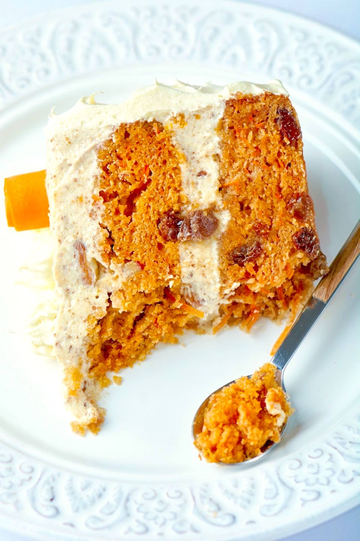 healthy carrot cake on a small white plate.